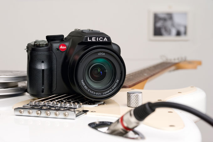 Leica V-Lux 3 dslr camera with guitar photo