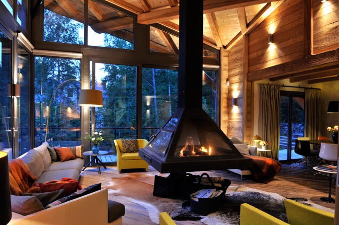 interior view of warm fireplace in modern Alpine Chalet