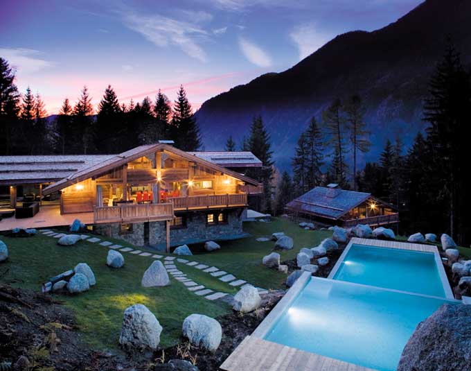 Panoramic sunset exterior shot of French Chalet